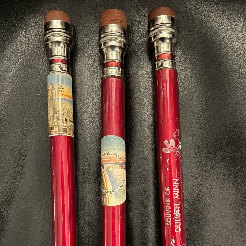 3 Oversized souvenir pencils.